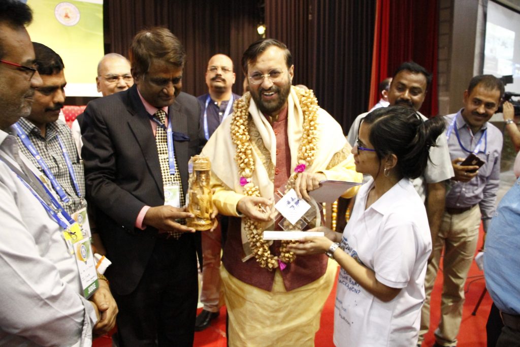 A shot of Publishing Developer presenting the MageQuill token to then-HRD Minister Shri Prakash Javadekar in Noida, India in March 2018