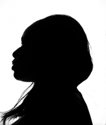 A silhouette of a woman's profile